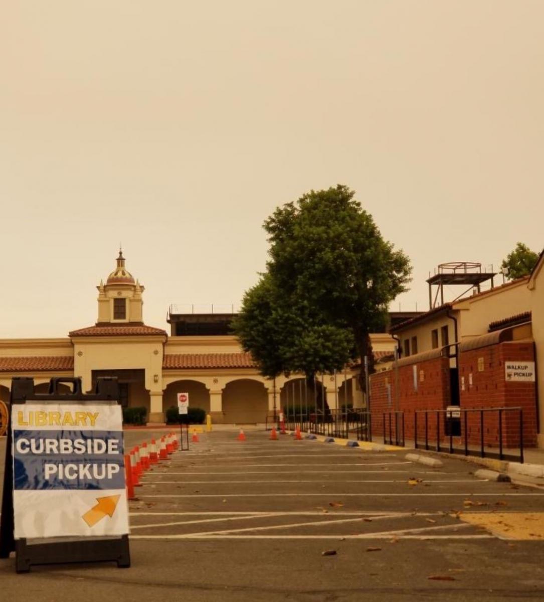 The curbside/walk-up pick-up location under a hazy sky from California wildfires in October